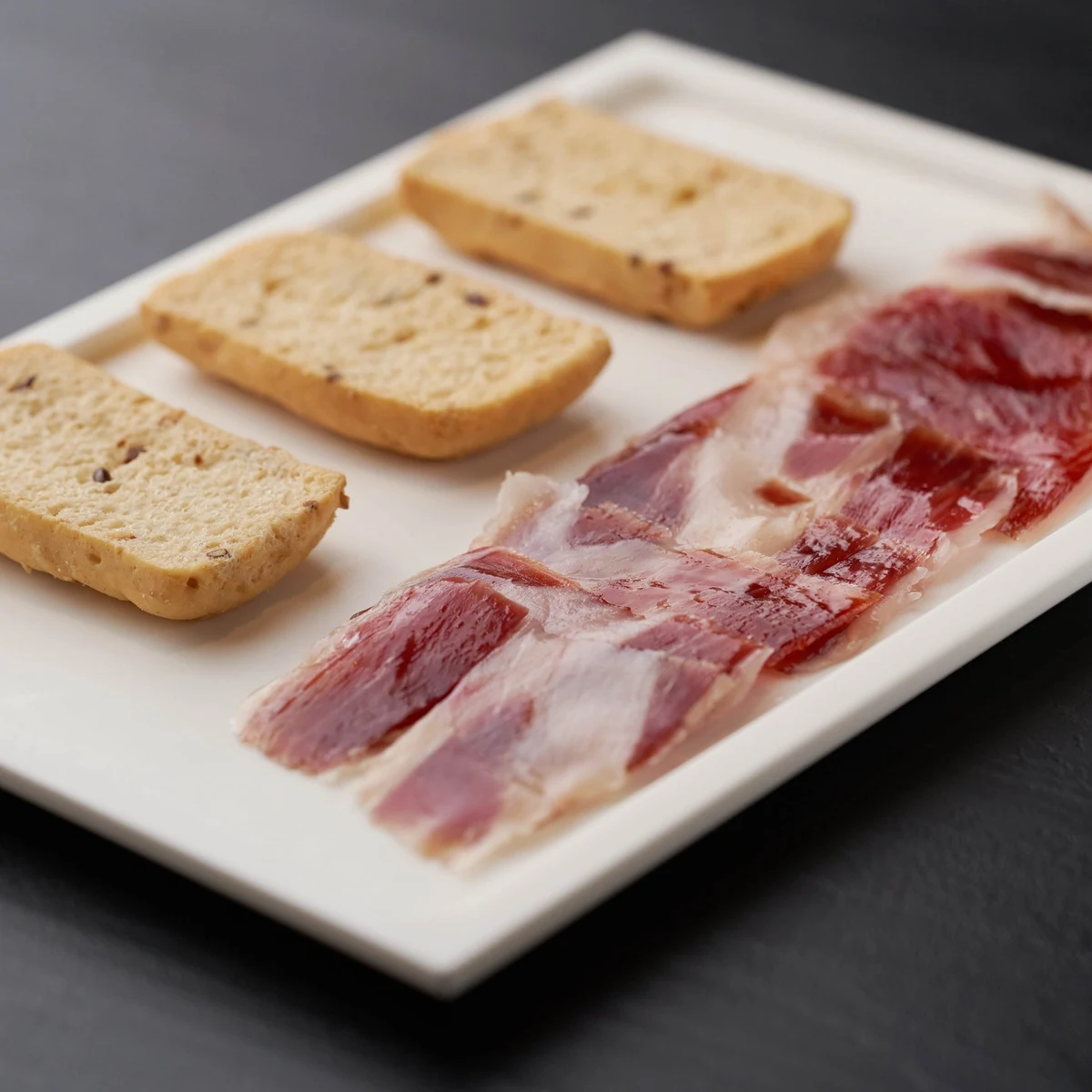 100% Iberian Pata Negra Oro VNC Acorn-Fed Ham, hand-sliced with a knife