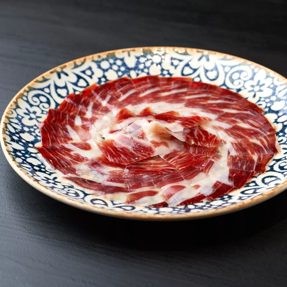 100% Iberian Pata Negra Oro VNC Acorn-Fed Ham, hand-sliced with a knife
