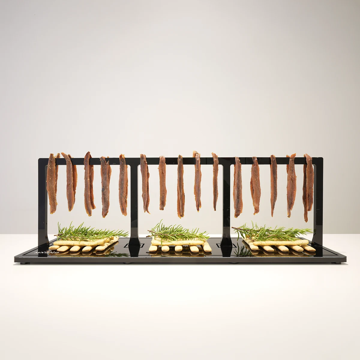 Plexiglass tabletop display for anchovy tasting